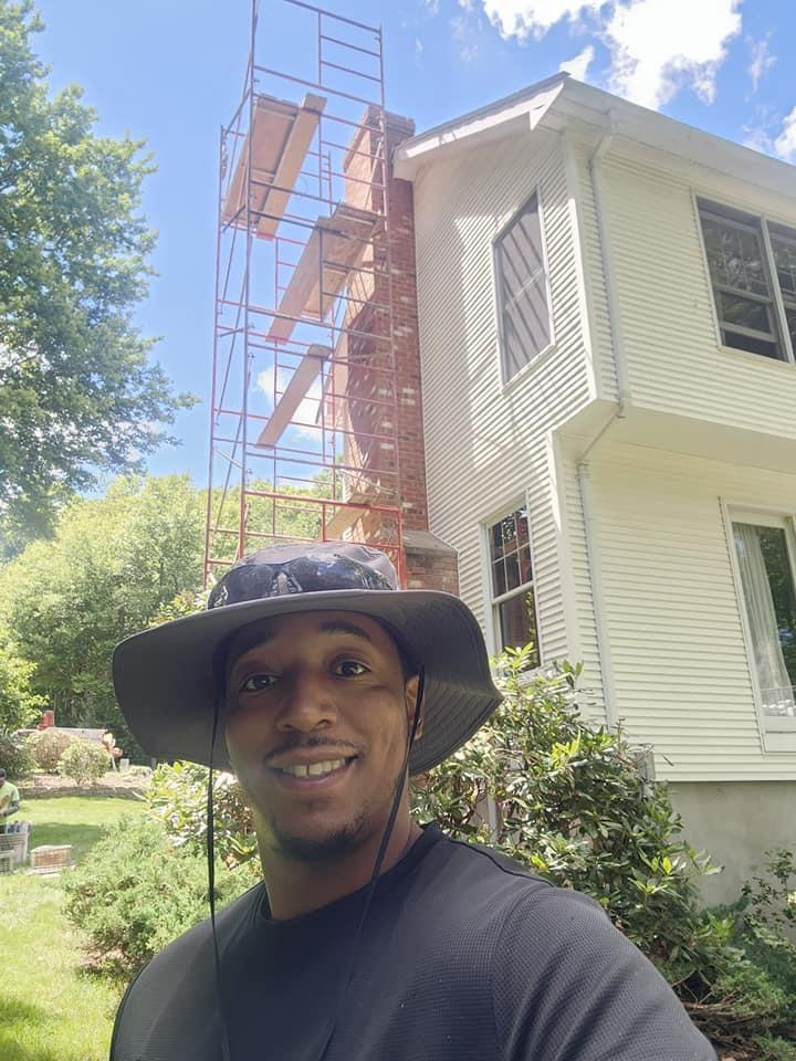 Chimney leak repair Connecticut - Mr. Kwame Owner of CHIMNEY AND STONE MASONRY LLC